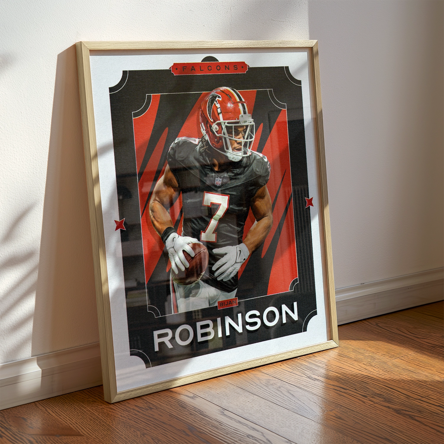 A Bijan Robinson poster displayed as modern sports wall art in the home of a Atlanta Falcons fan.
