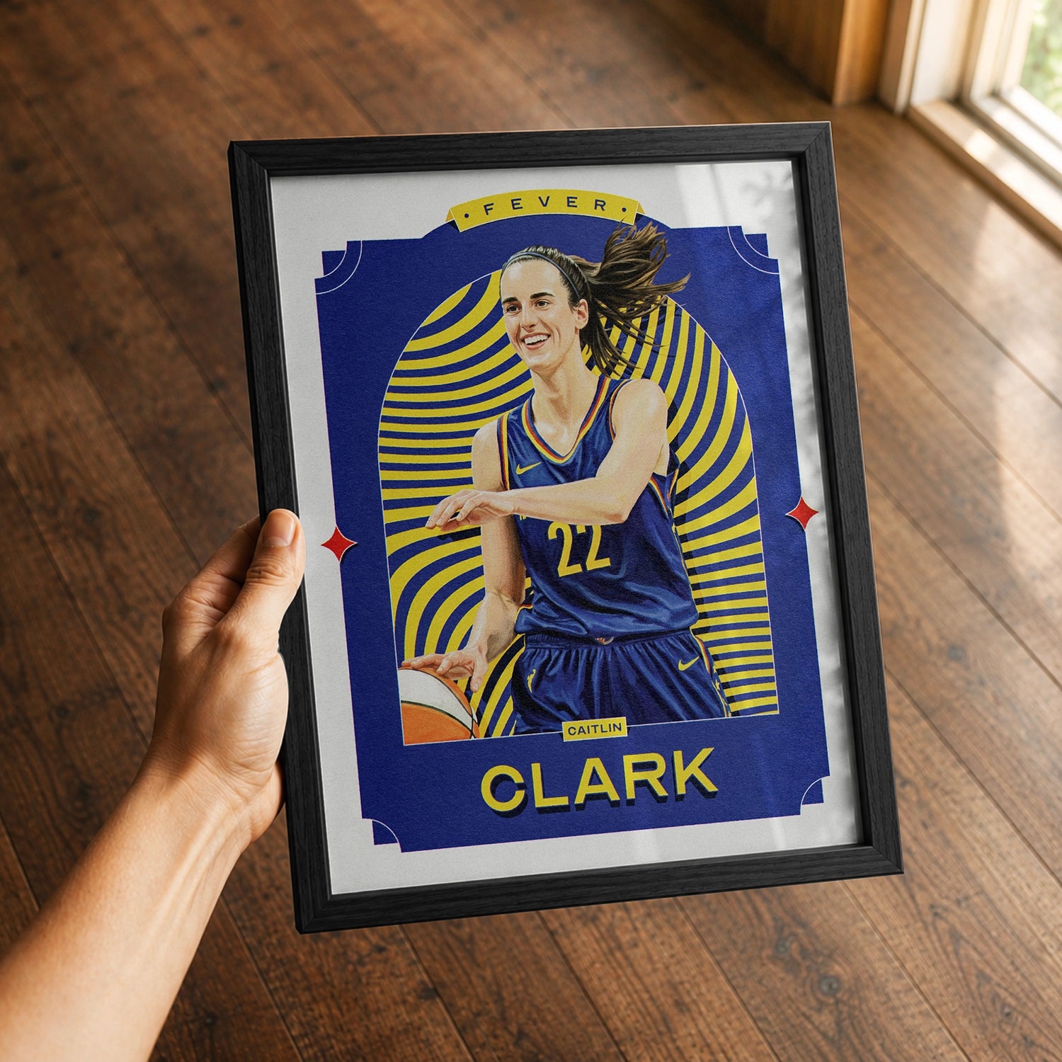 A premium Caitlin Clark poster in a 8x10 frame being gifted to a Indiana Fever fan.