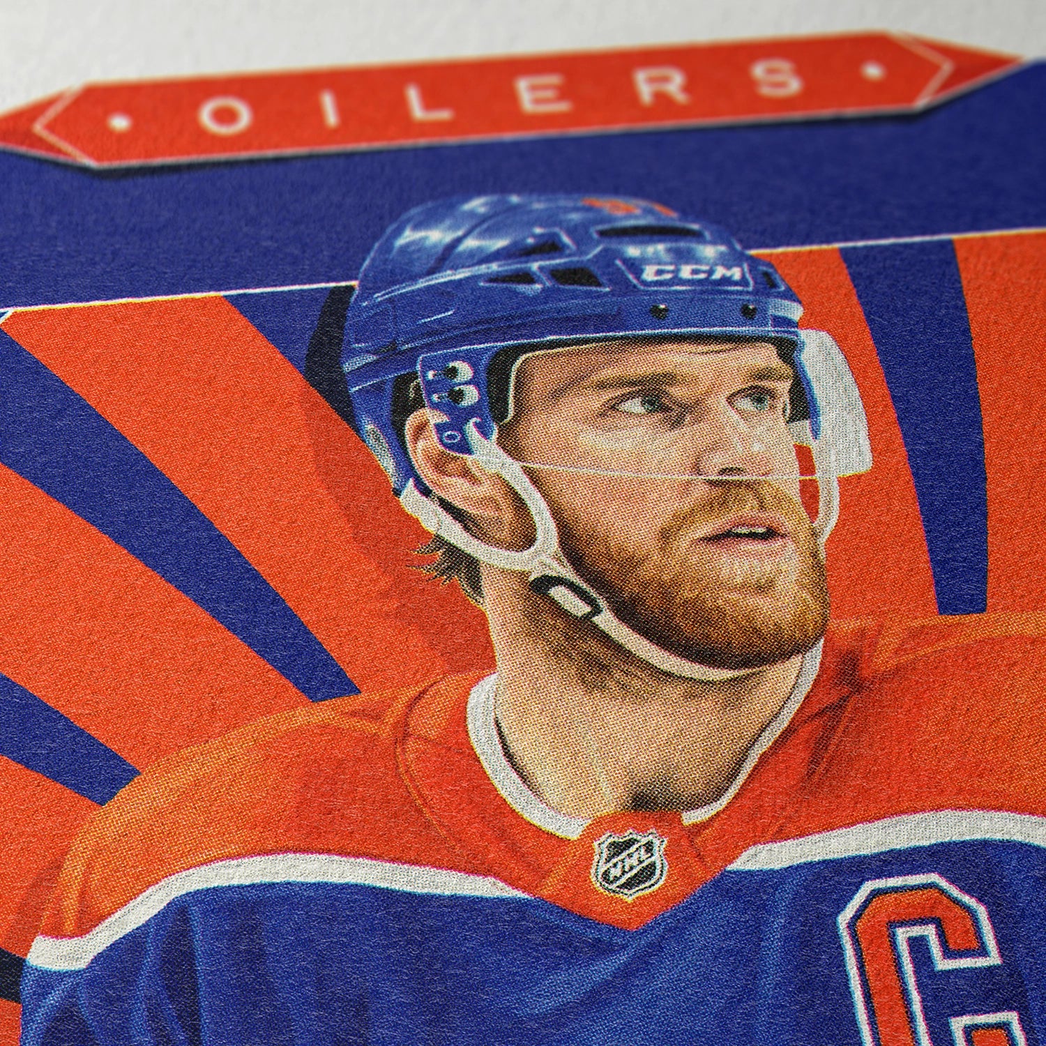 Closeup of our Connor McDavid Edmonton Oilers Poster showing the high-definition design quality and vintage graphic elements.