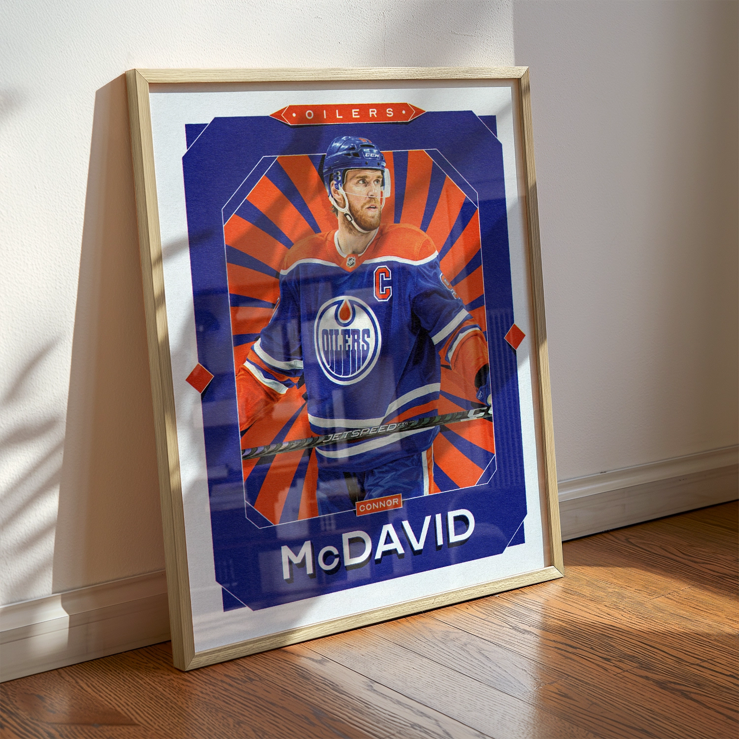 A Connor McDavid poster displayed as modern sports wall art in the home of a Edmonton Oilers fan.