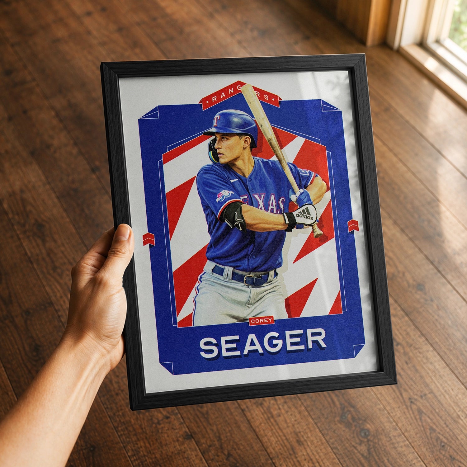A premium Corey Seager poster in a 8x10 frame being gifted to a Texas Rangers fan.