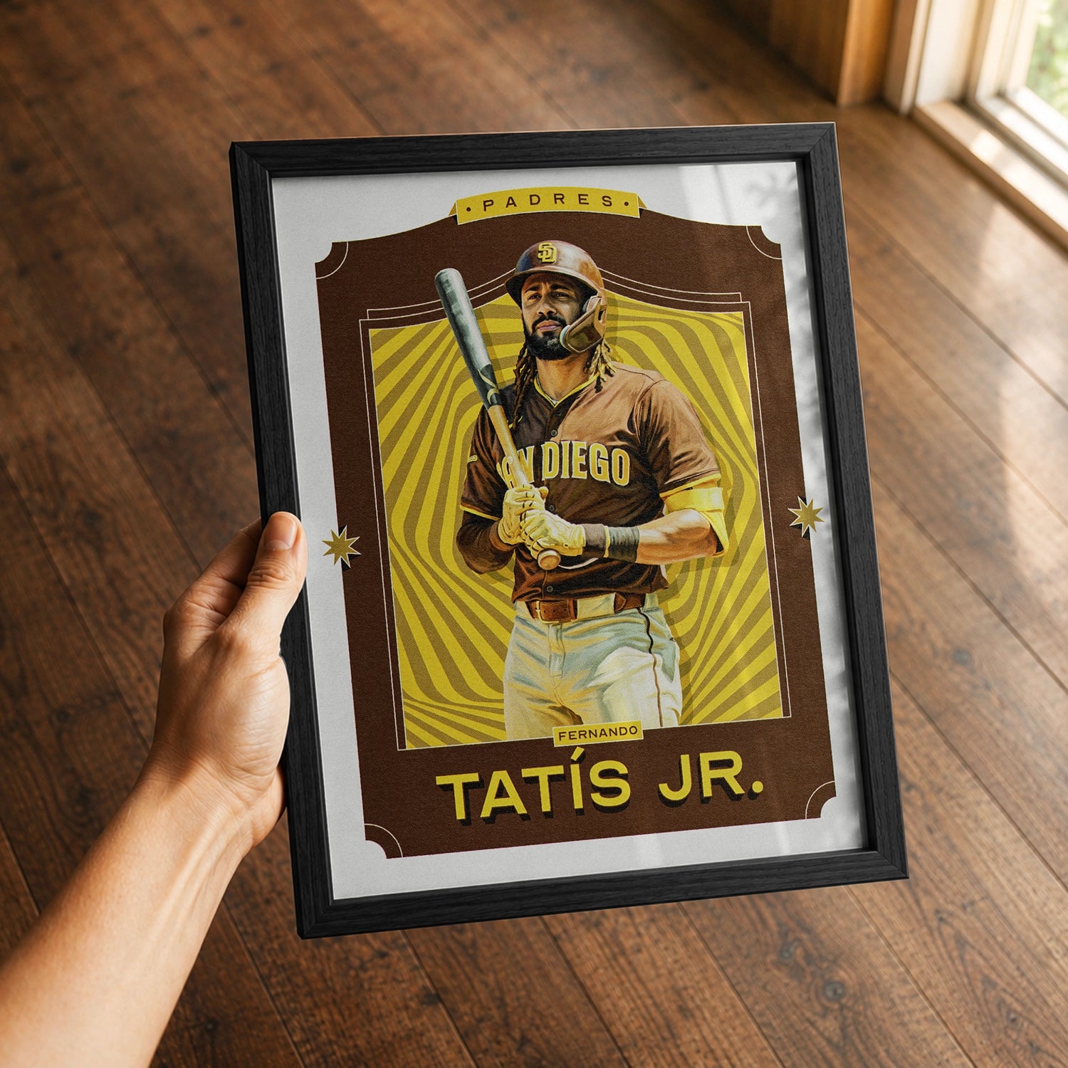 A premium Fernando Tatis Jr. poster in a 8x10 frame being gifted to a San Diego Padres fan.