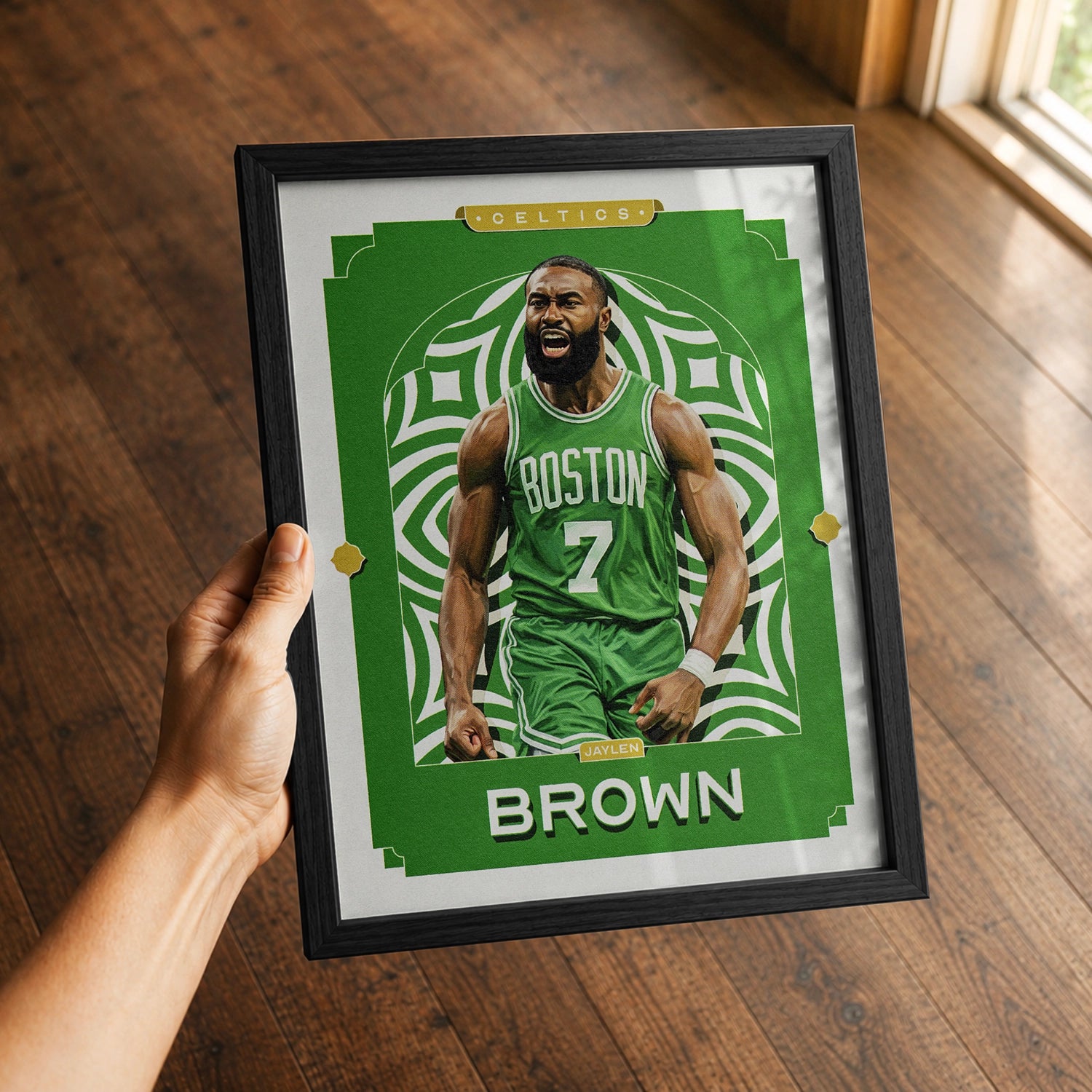 A premium Jaylen Brown poster in a 8x10 frame being gifted to a Boston Celtics fan.
