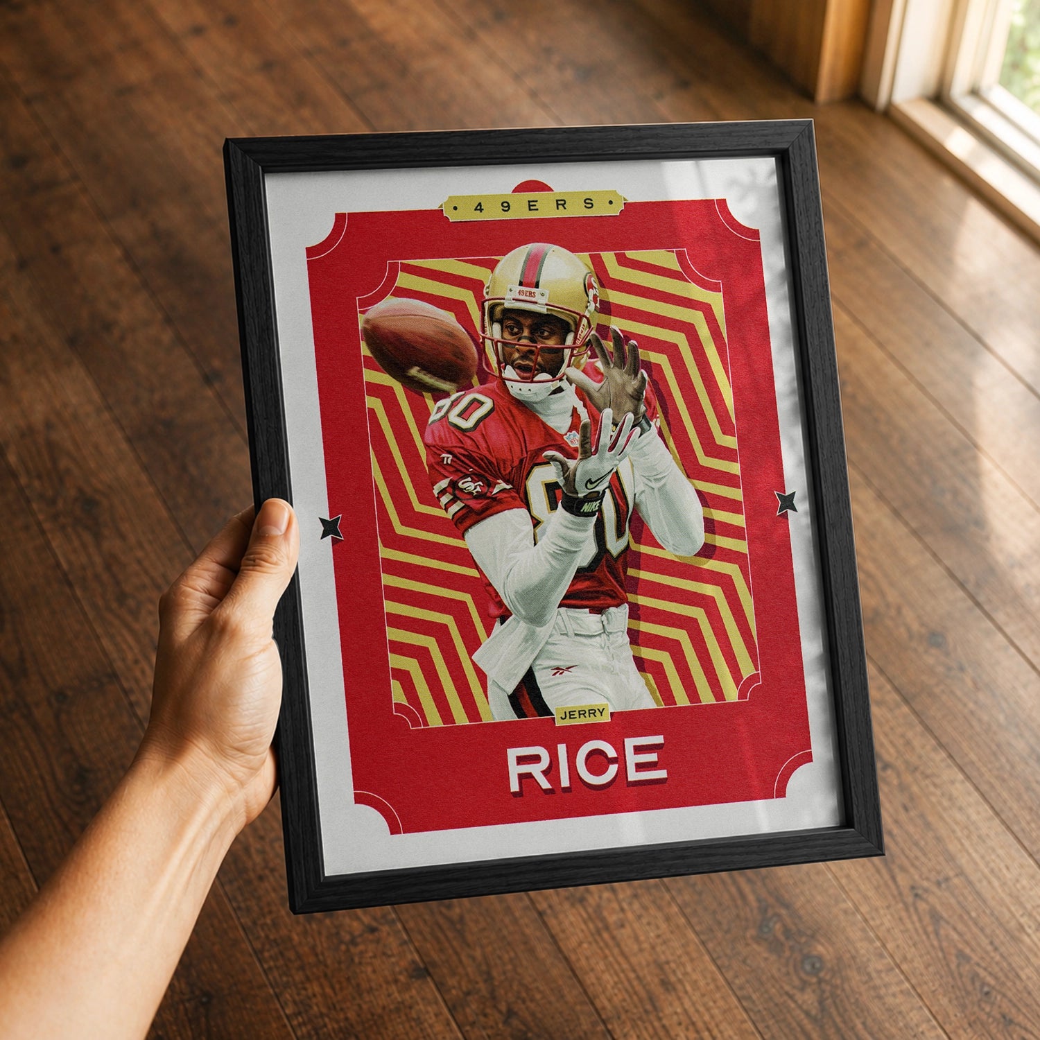 A premium Jerry Rice poster in a 8x10 frame being gifted to a San Francisco 49ers fan.