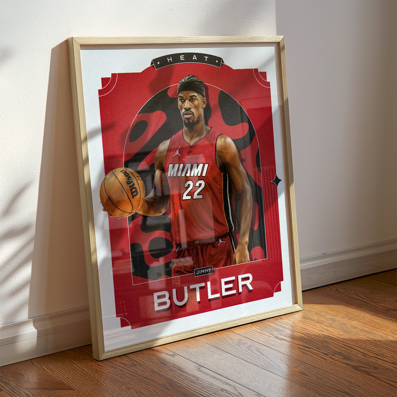 A Jimmy Butler poster displayed as modern sports wall art in the home of a Heat fan.