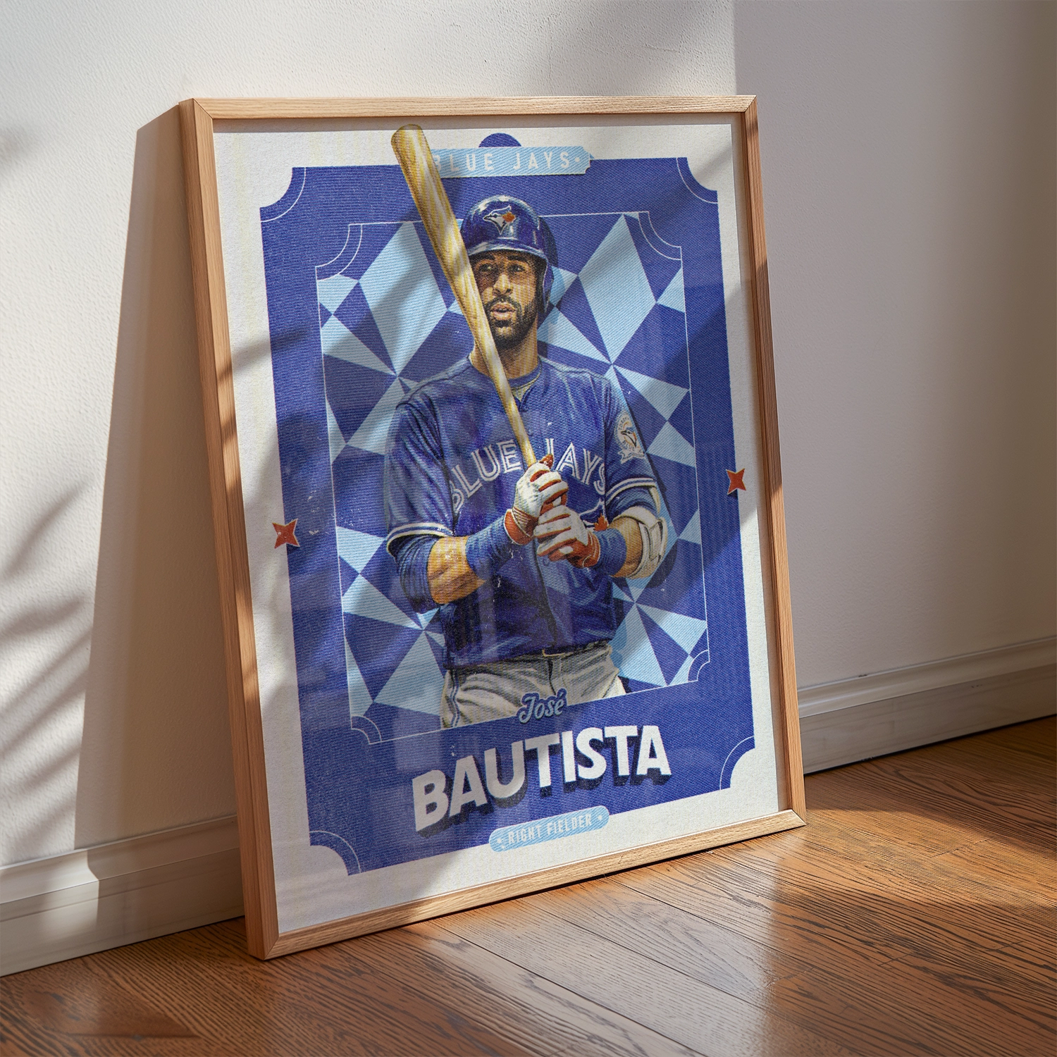 A Jose Bautista poster displayed as modern sports wall art in the home of a Toronto Blue Jays fan.