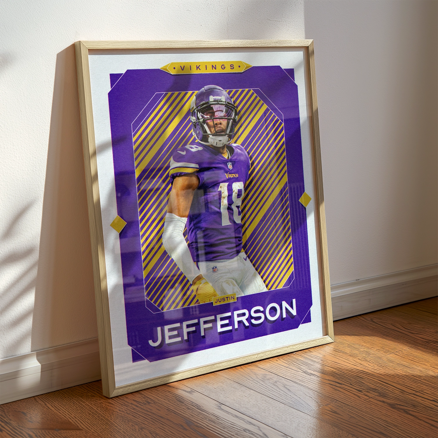 A Justin Jefferson poster displayed as modern sports wall art in the home of a Minnesota Vikings fan.
