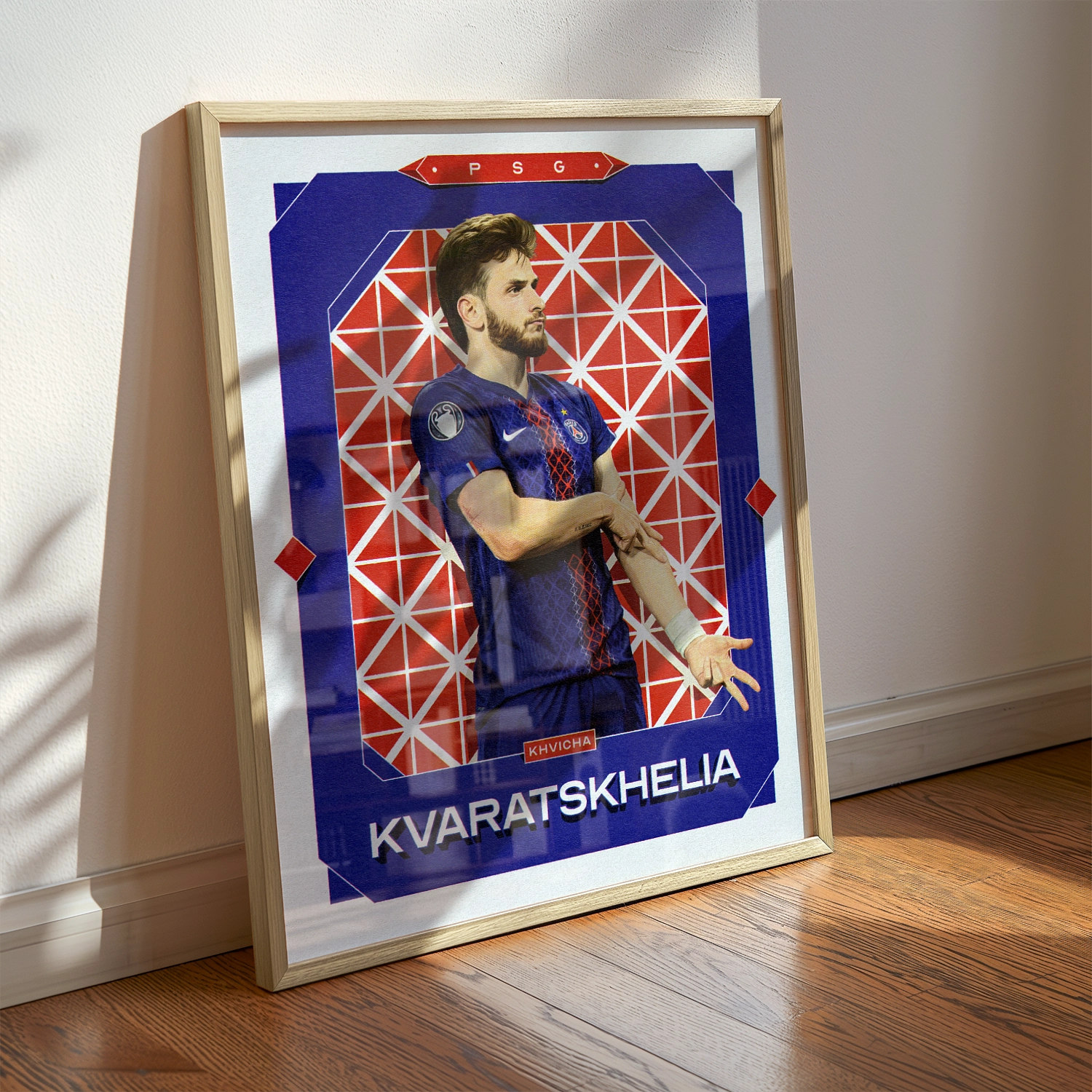 A Khvicha Kvaratskhelia poster displayed as modern sports wall art in the home of a Paris Saint-germain fan.