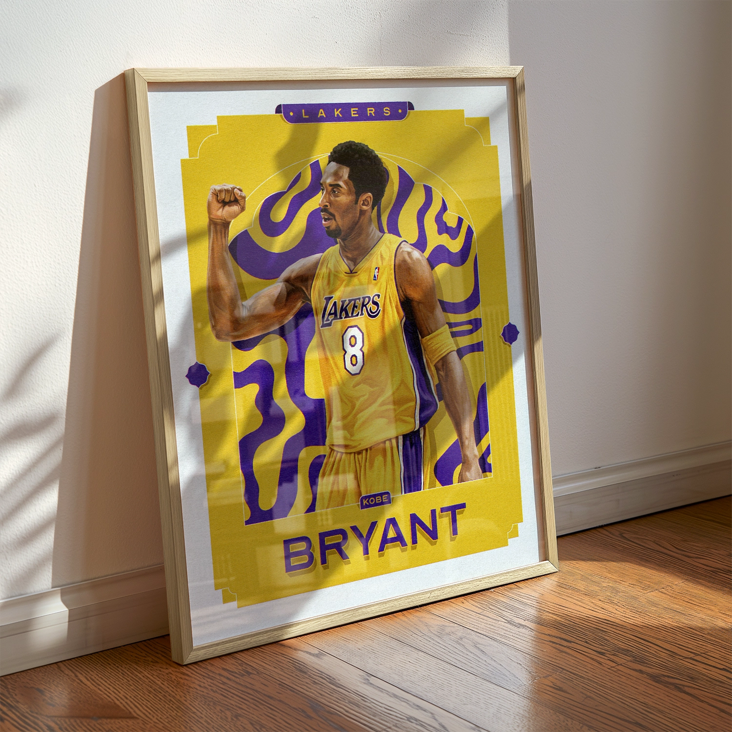 A Kobe Bryant poster displayed as modern sports wall art in the home of a Los Angeles Lakers fan.