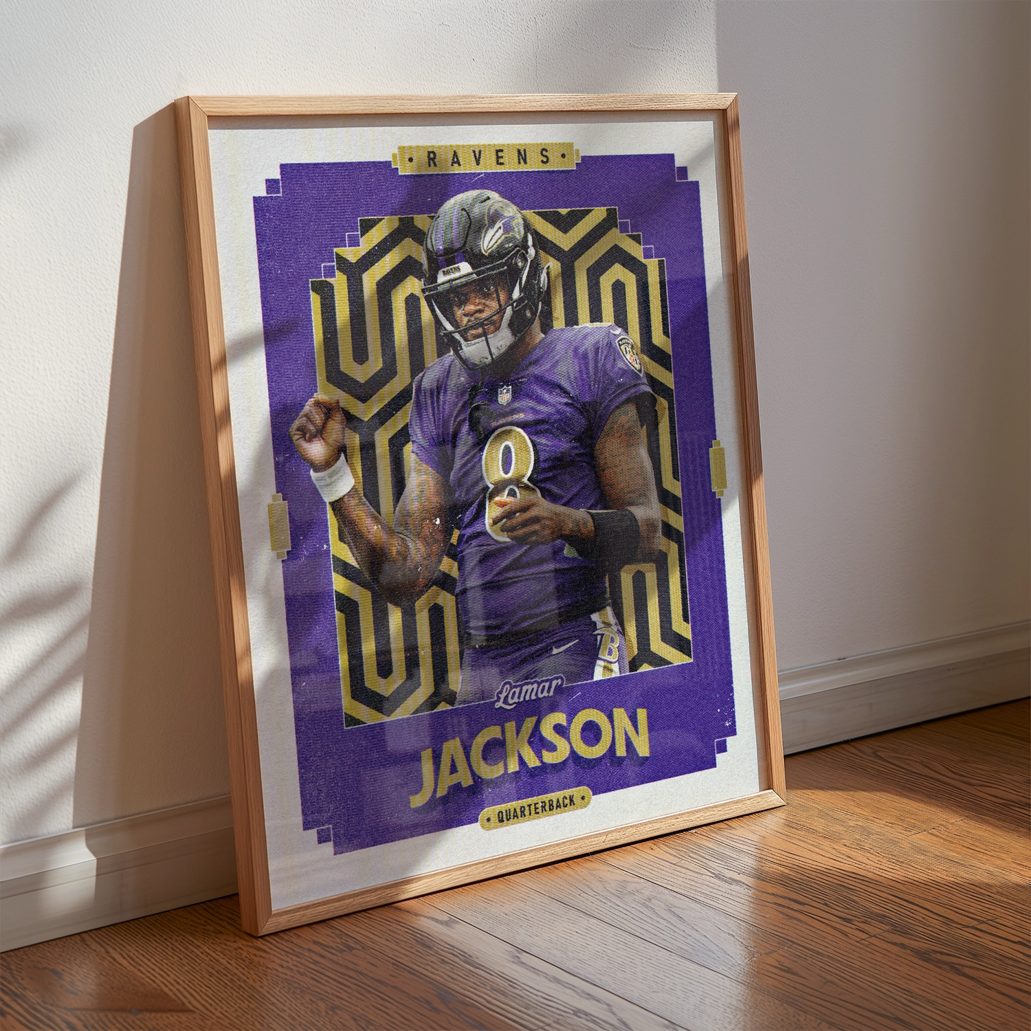 A Lamar Jackson poster displayed as modern sports wall art in the home of a Baltimore Ravens fan.