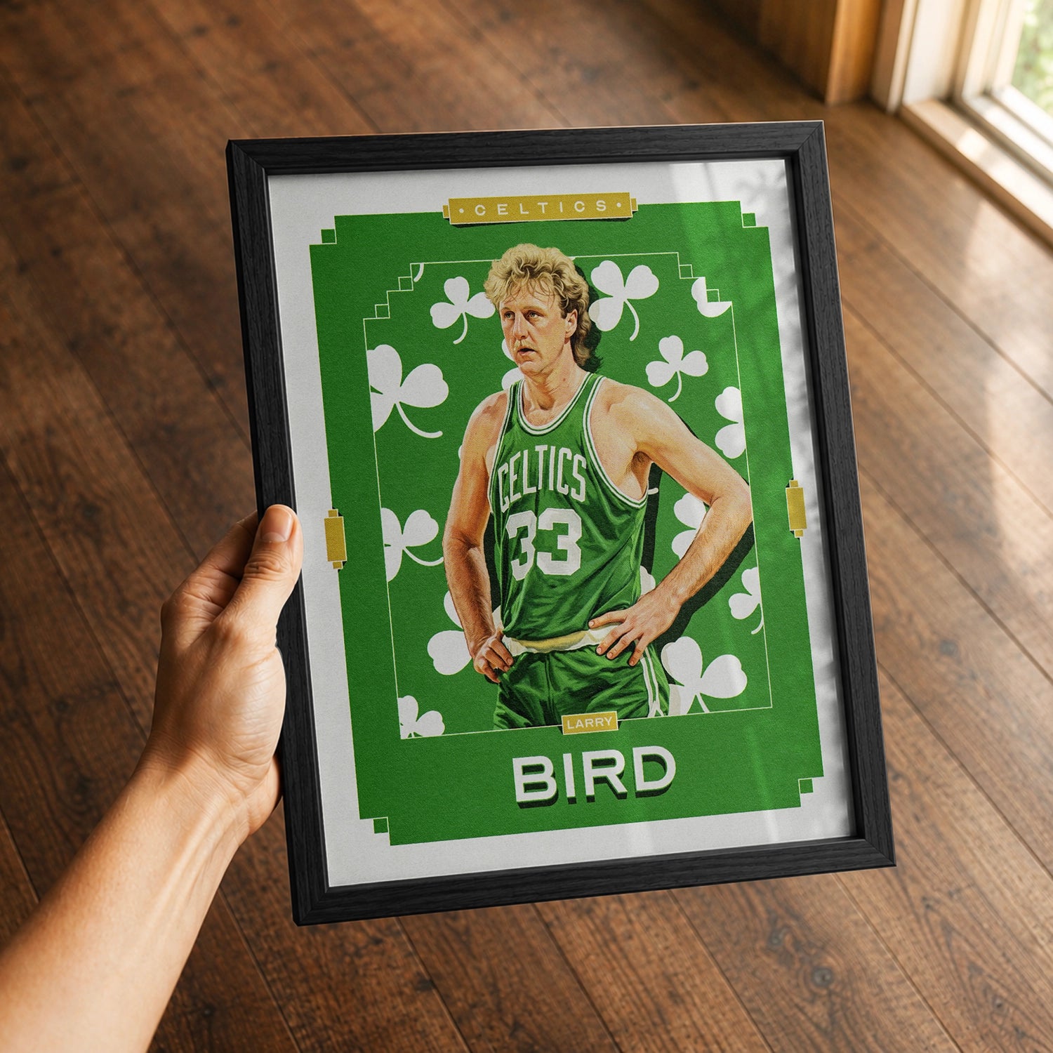 A premium larry bird poster being gifted to a boston celtics fan.