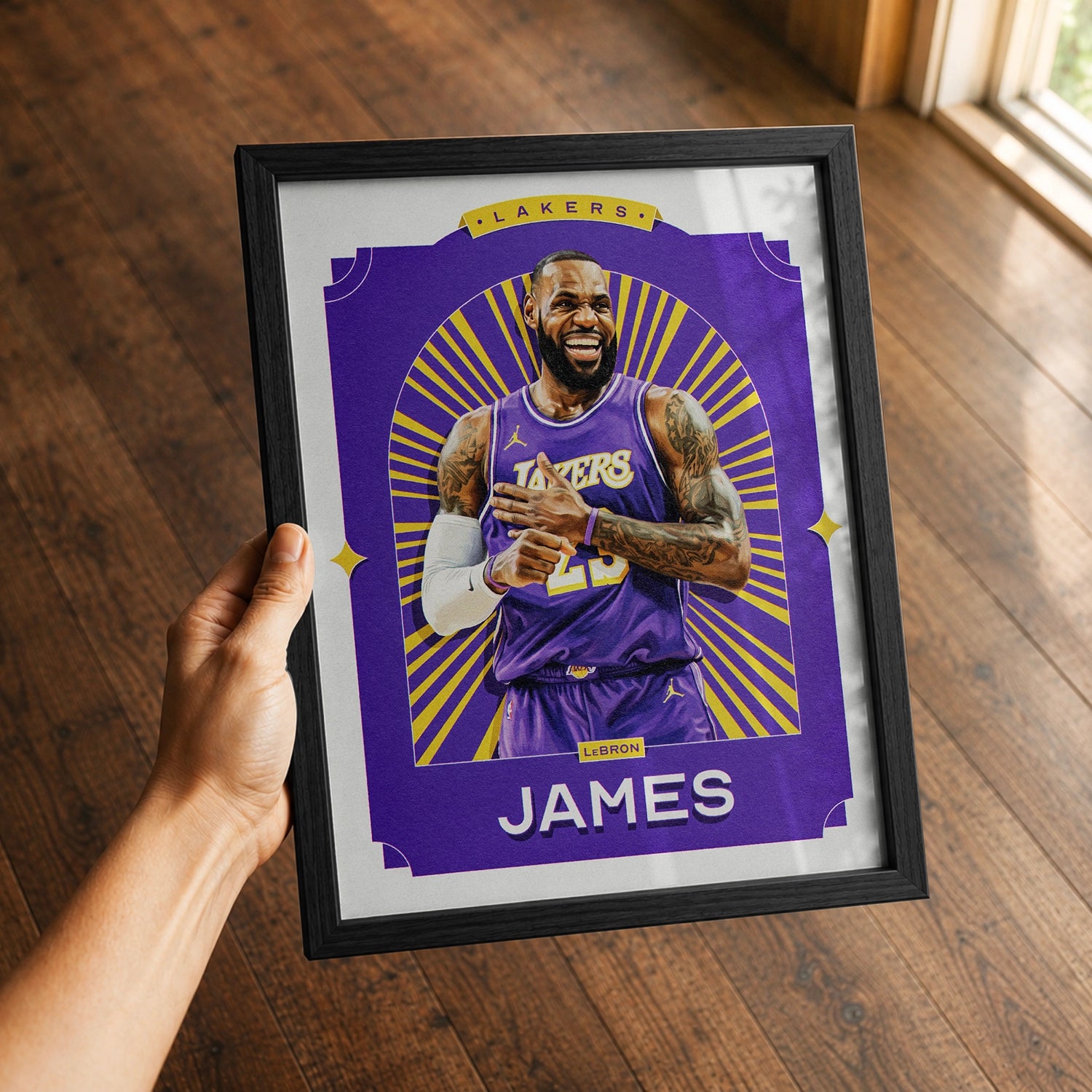 A premium LeBron James poster in a 8x10 frame being gifted to a Los Angeles Lakers fan.