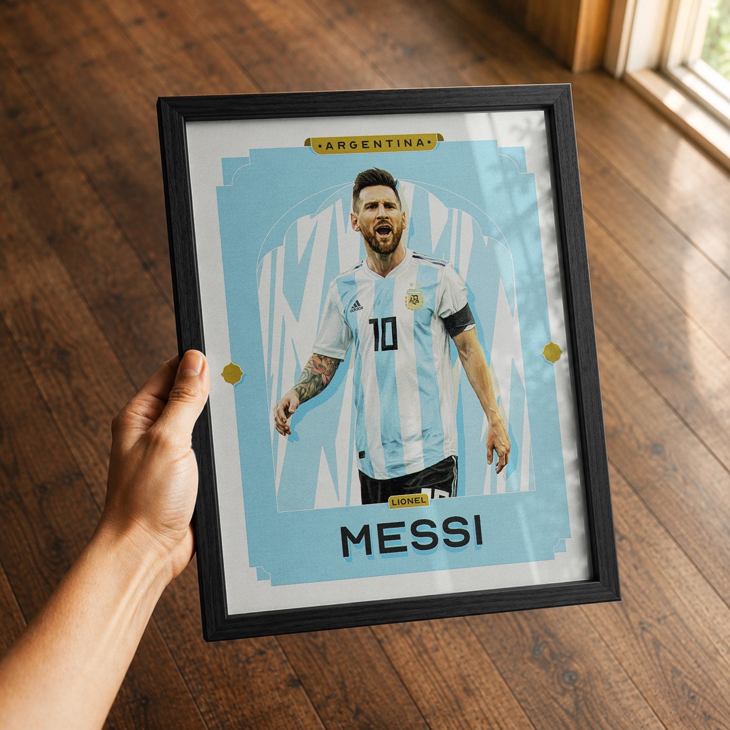 A premium Lionel Messi poster in a 8x10 frame being gifted to a Argentina fan.