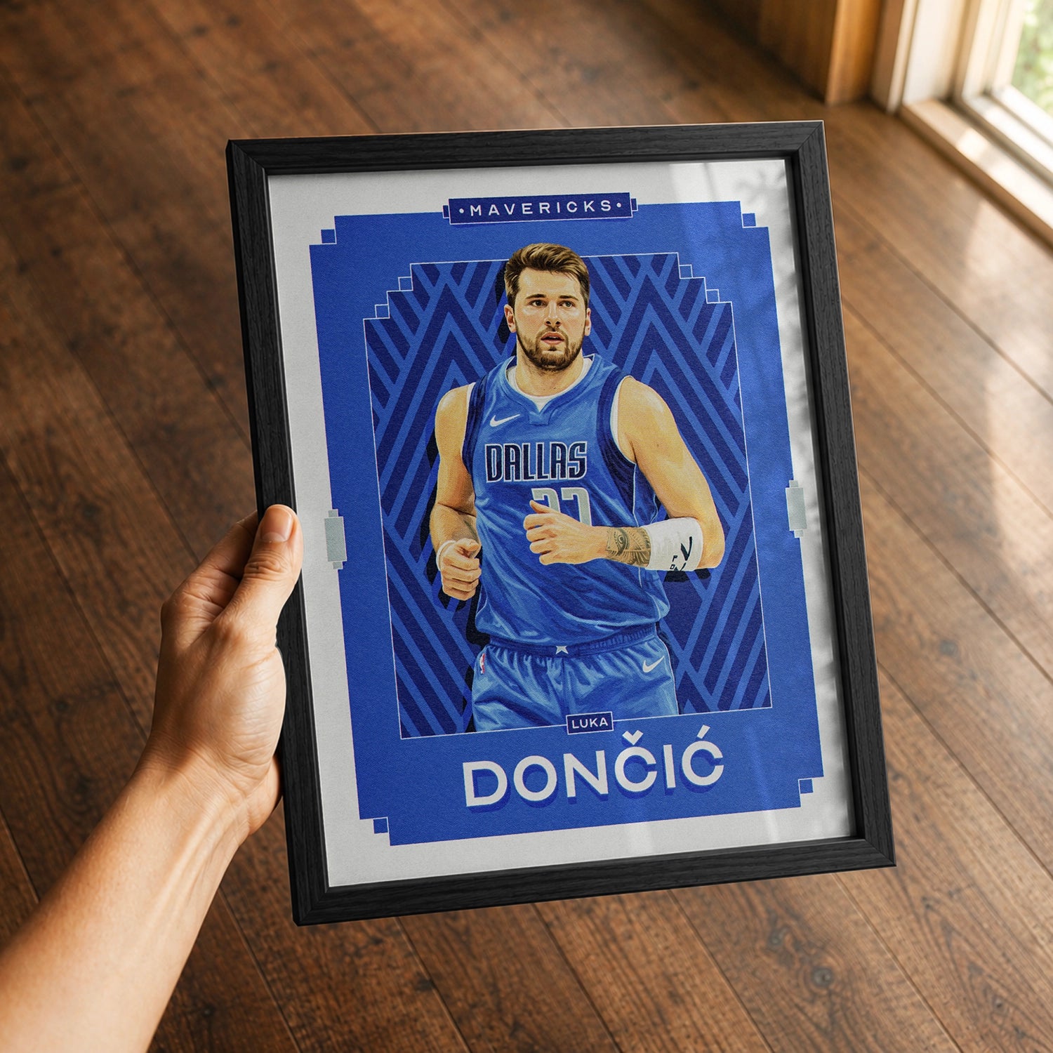 A premium Luka Doncic poster in a 8x10 frame being gifted to a Dallas Maverics fan.
