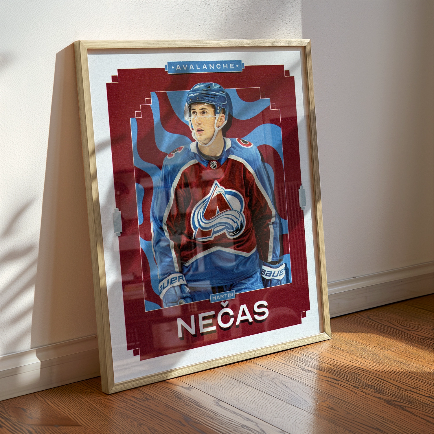 A Martin Necas poster displayed as modern sports wall art in the home of a Colorado Avalanche fan.
