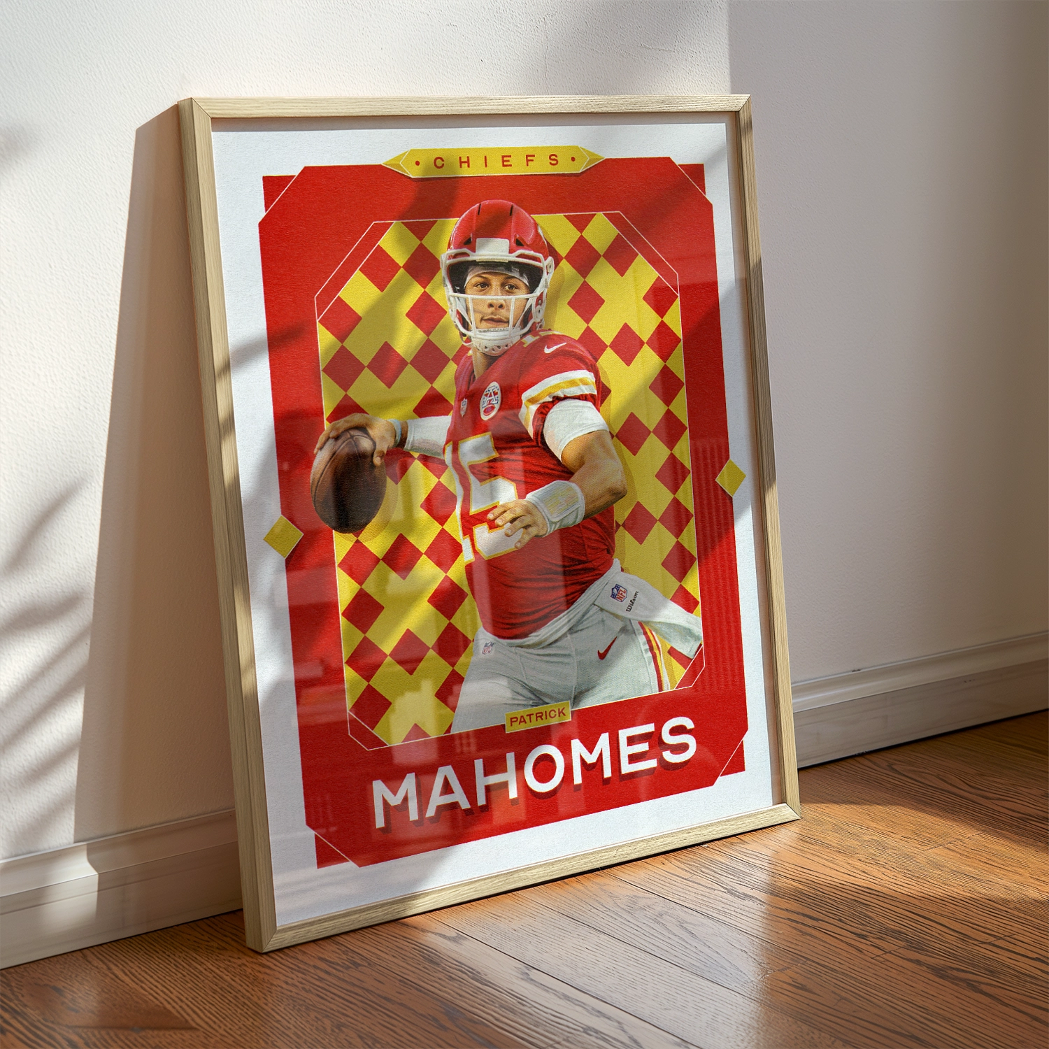 A Patrick Mahomes poster displayed as modern sports wall art in the home of a Kansas City Chiefs fan.