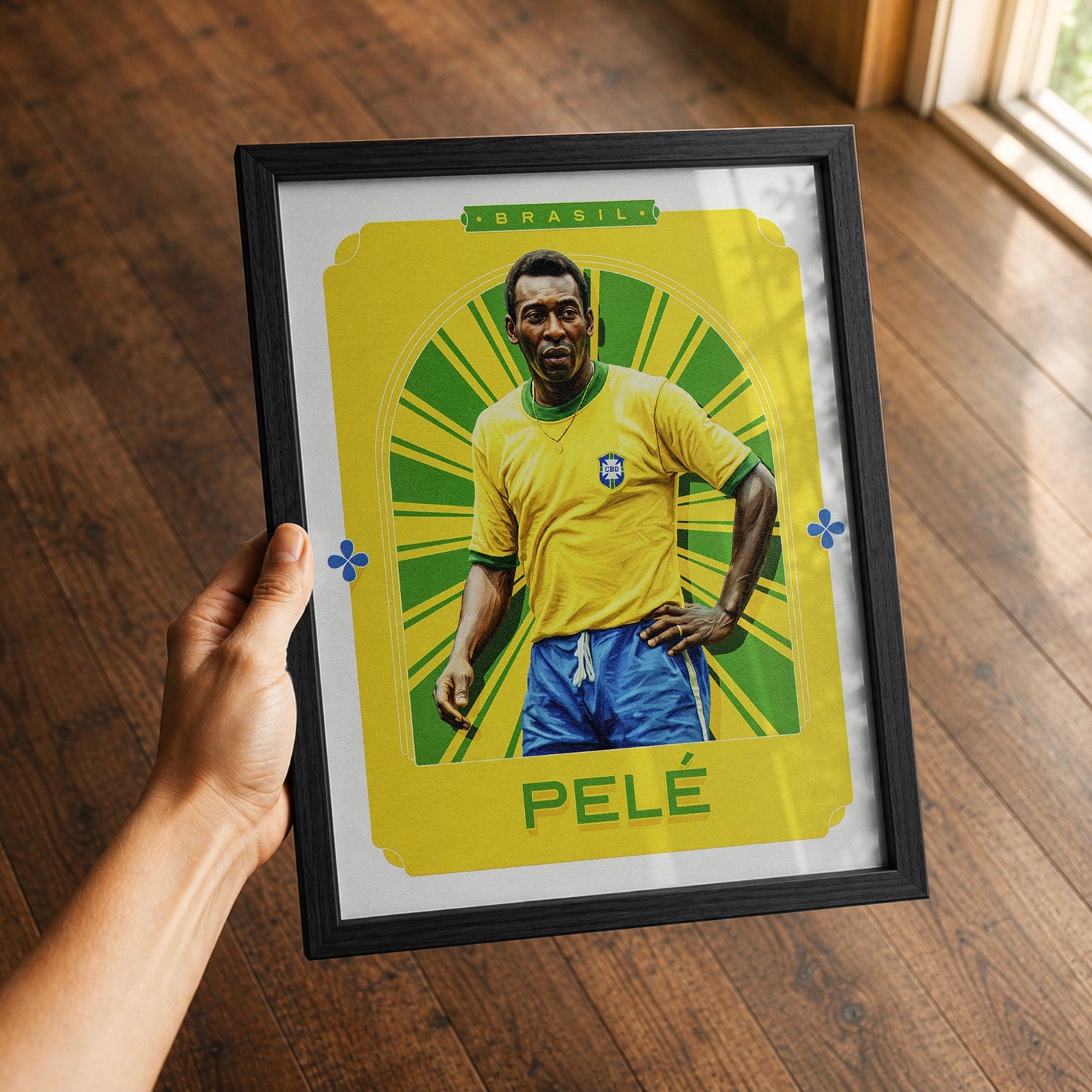 A premium Pele poster in a 8x10 frame being gifted to a Brazil fan.