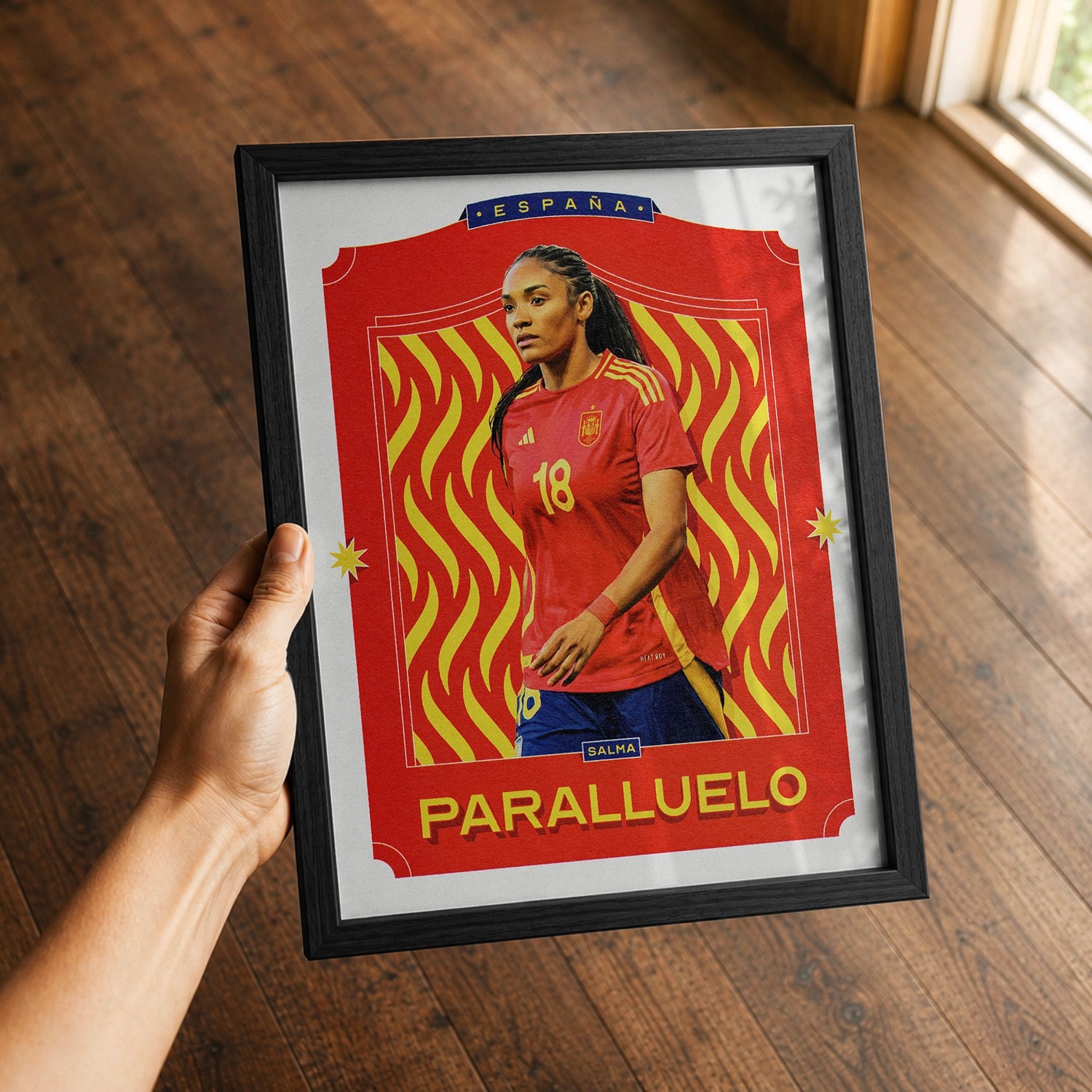 A premium Salma Paralluelo poster in a 8x10 frame being gifted to a Spain fan.