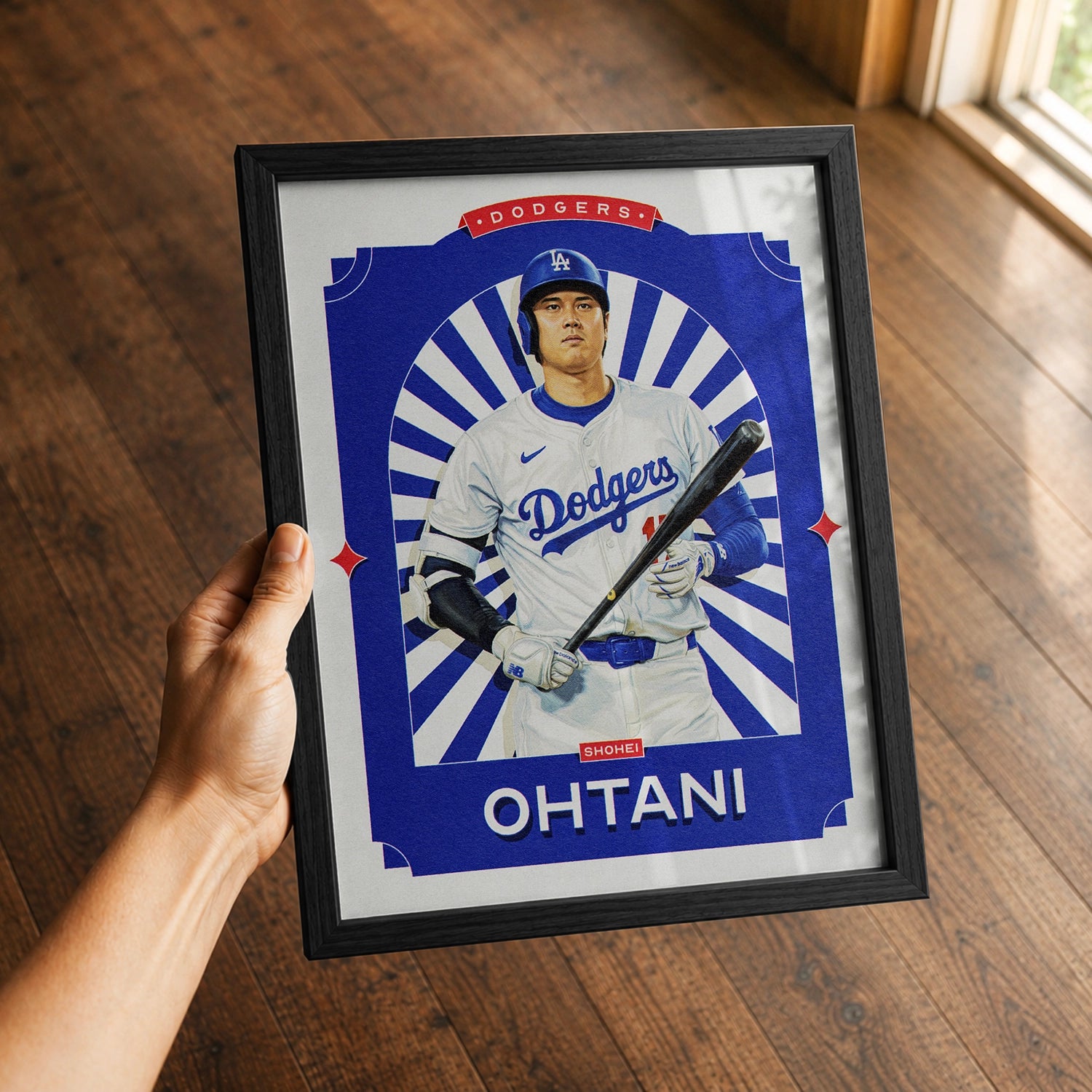 A premium Shohei Ohtani poster in a 8x10 frame being gifted to a Los Angeles Dodgers fan.