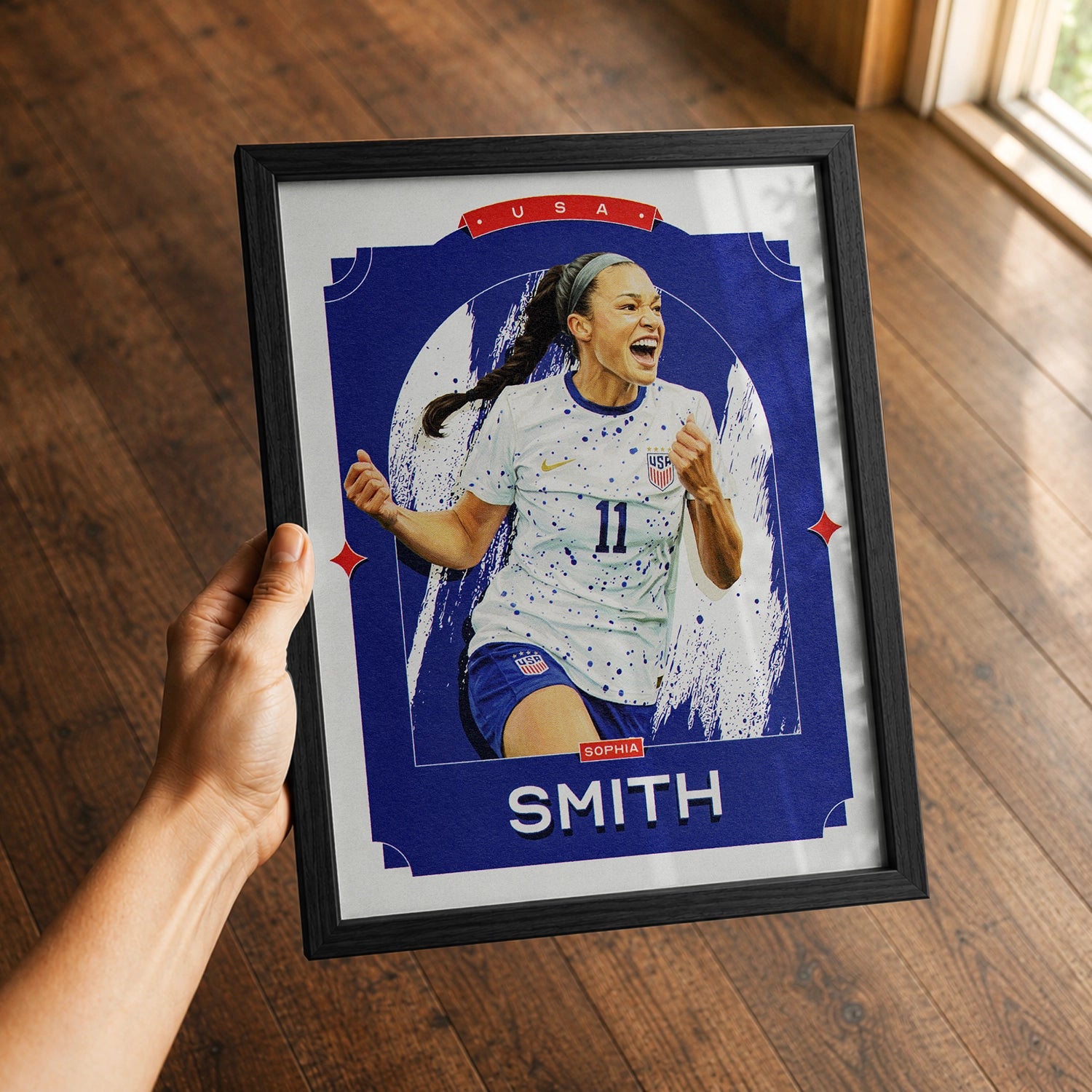 A premium Sophia Smith poster in a 8x10 frame being gifted to a USWNT fan.
