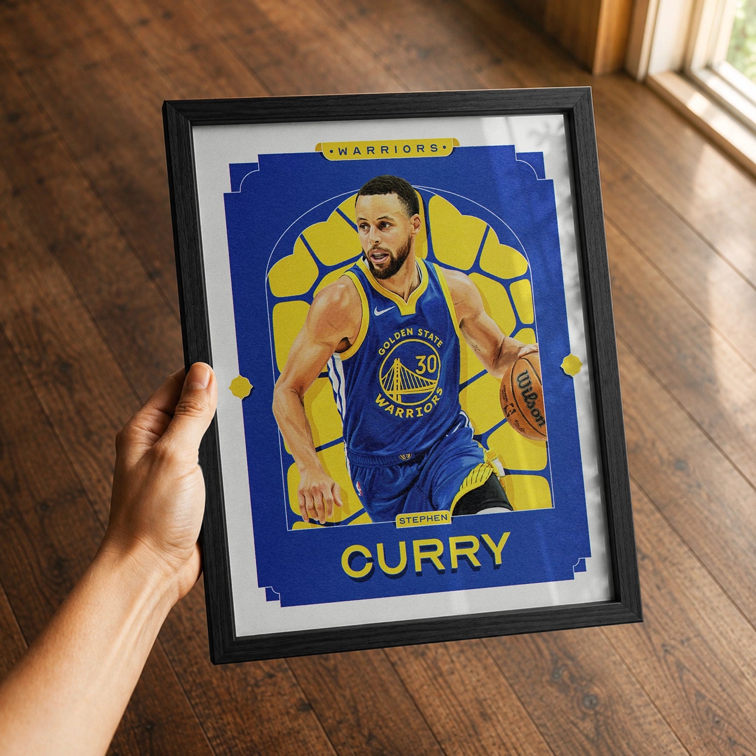 A premium Stephen Curry poster in a 8x10 frame being gifted to a Golden State Warriors fan.