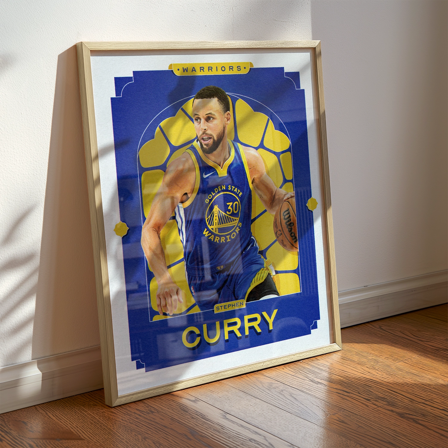 A Stephen Curry poster displayed as modern sports wall art in the home of a Golden State Warriors fan.