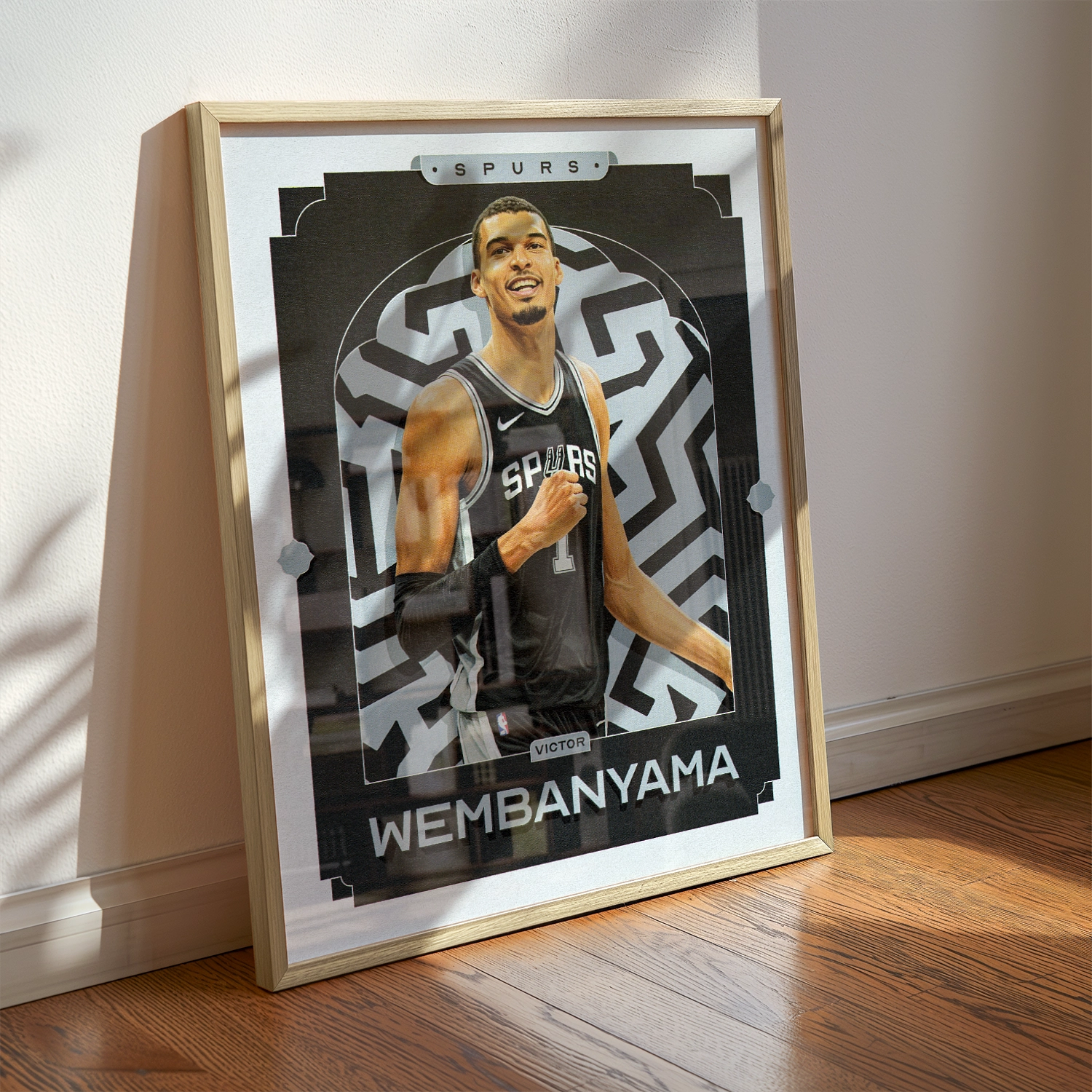 A Victor Wembanyama poster displayed as modern sports wall art in the home of a San Antonio Spurs fan.