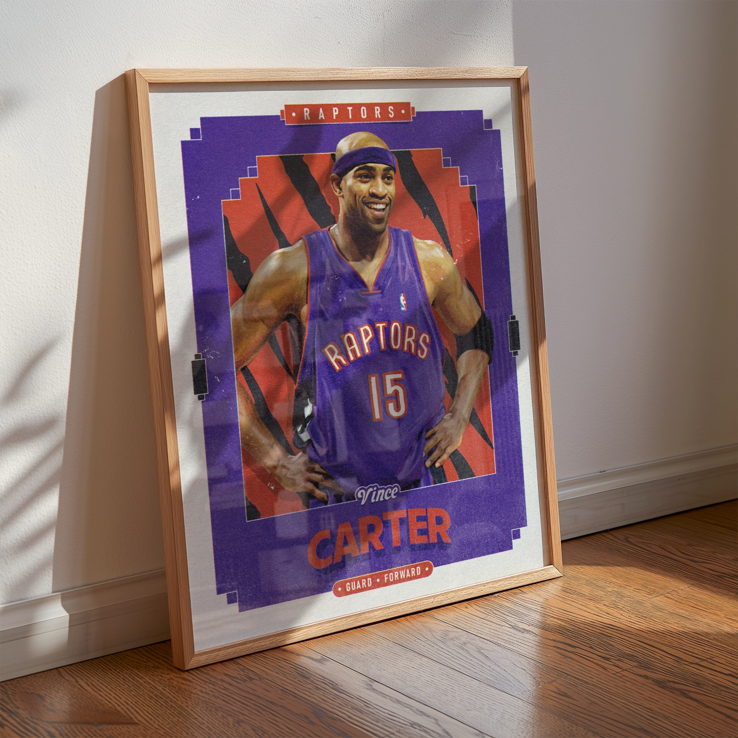 A Vince Carter poster displayed as modern sports wall art in the home of a Toronto Raptors fan.